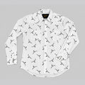 A white long-sleeve button-up shirt with an all-over black bird print, laid flat on a neutral gray background.