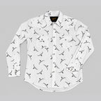 A white long-sleeve button-up shirt with an all-over black bird print, laid flat on a neutral gray background.